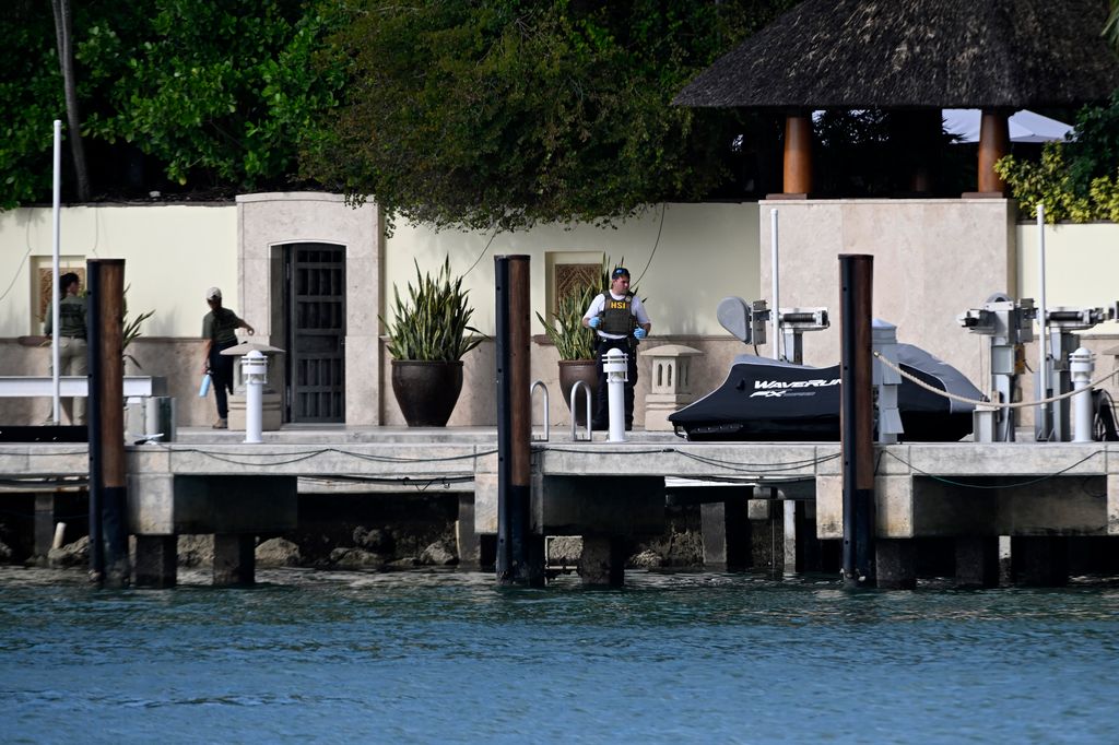 MIAMI BEACH, FL - MARCH 25: Police and Homeland Security officers are seen at the waterfront mansion of Sean Combs aka Diddy in Miami during a bi-coastal raid on March 25, 2024 in Miami Beach, Florida. (Photo by MEGA/GC Images)