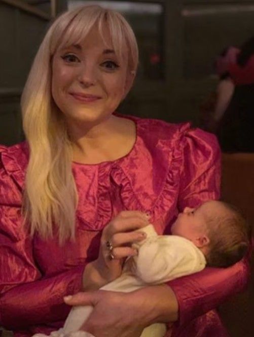 Helen George holding baby 