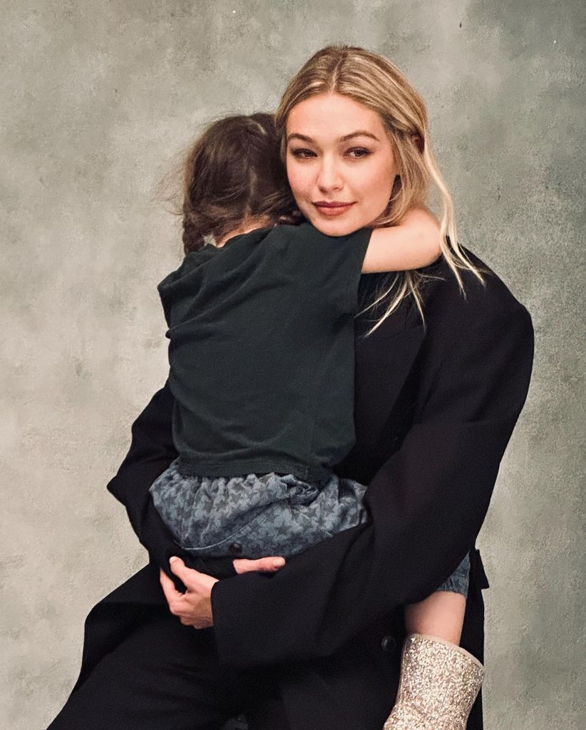 Gigi Hadid holding her daughter