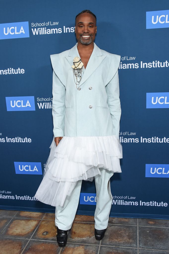 Billy Porter in pale blue jacket and white skirt at Williams Institute Legacy Gala Event, 