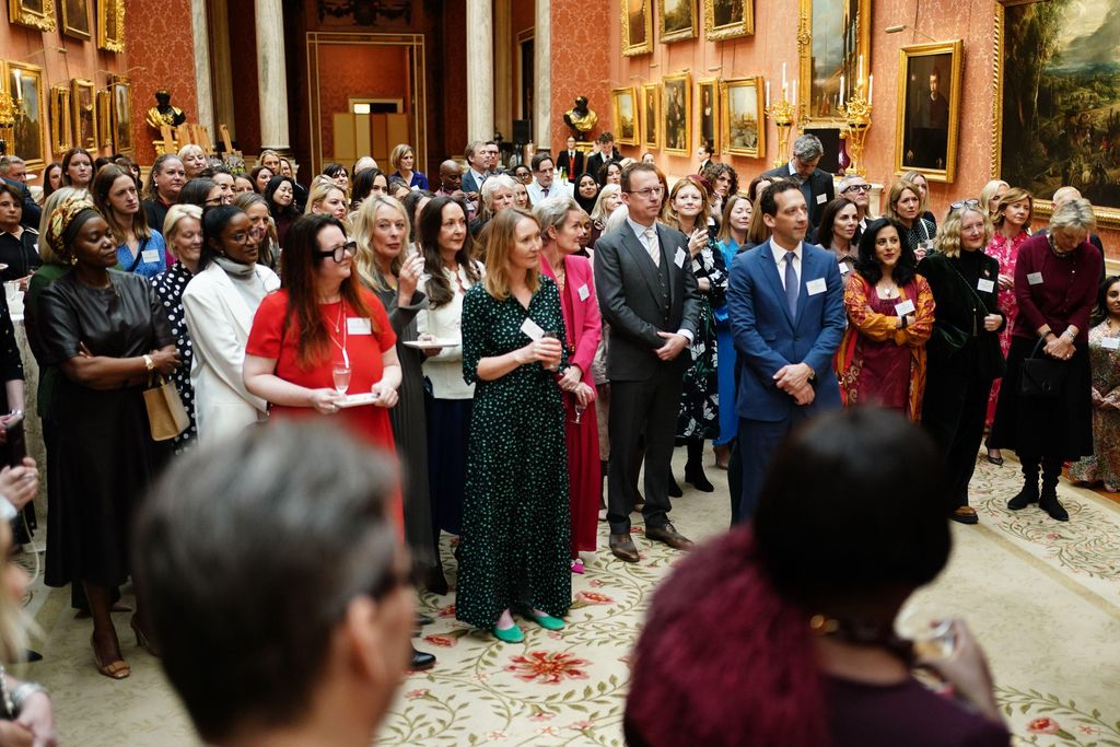 queen camilla giving speech to attendees