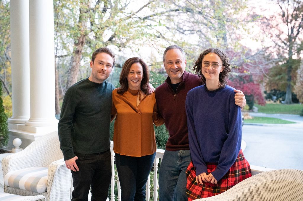 Cole Emhoff, Kamala Harris, Doug Emhoff and Ella Emhoff pose together on a balcony