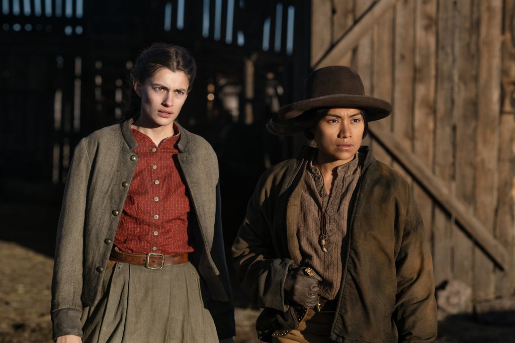 two women standing outdoors