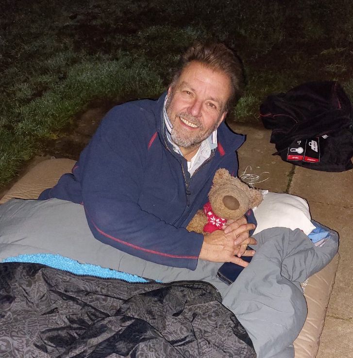 Martin Roberts lying on the ground