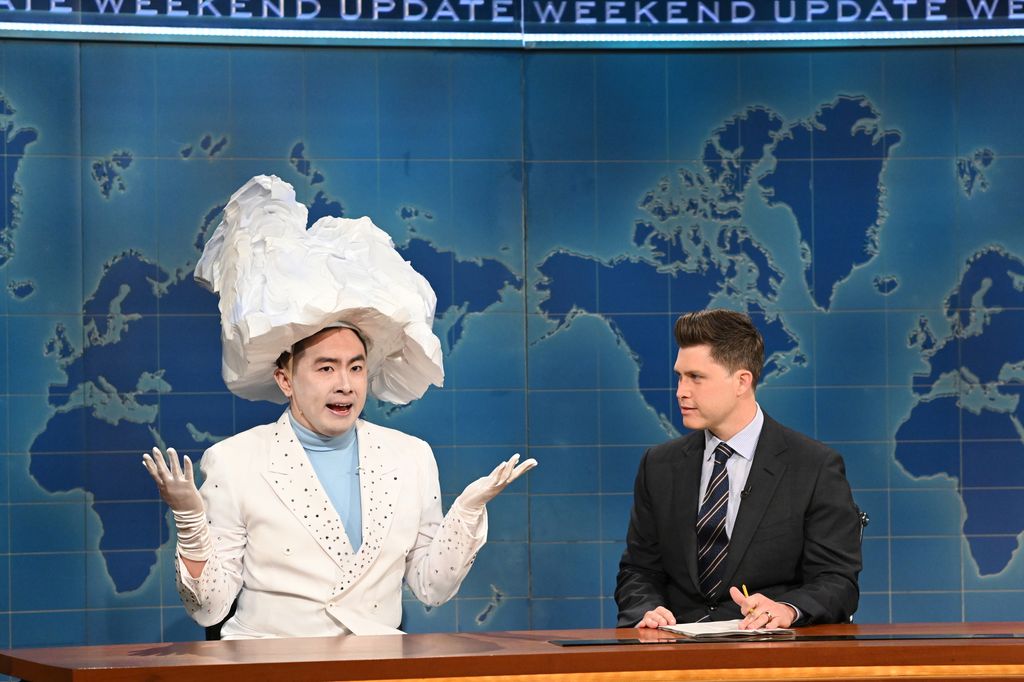 Bowen Yang as 'The Iceberg That Sank The Titanic' and anchor Colin Jost during Weekend Update on Saturday, April 10, 2021 