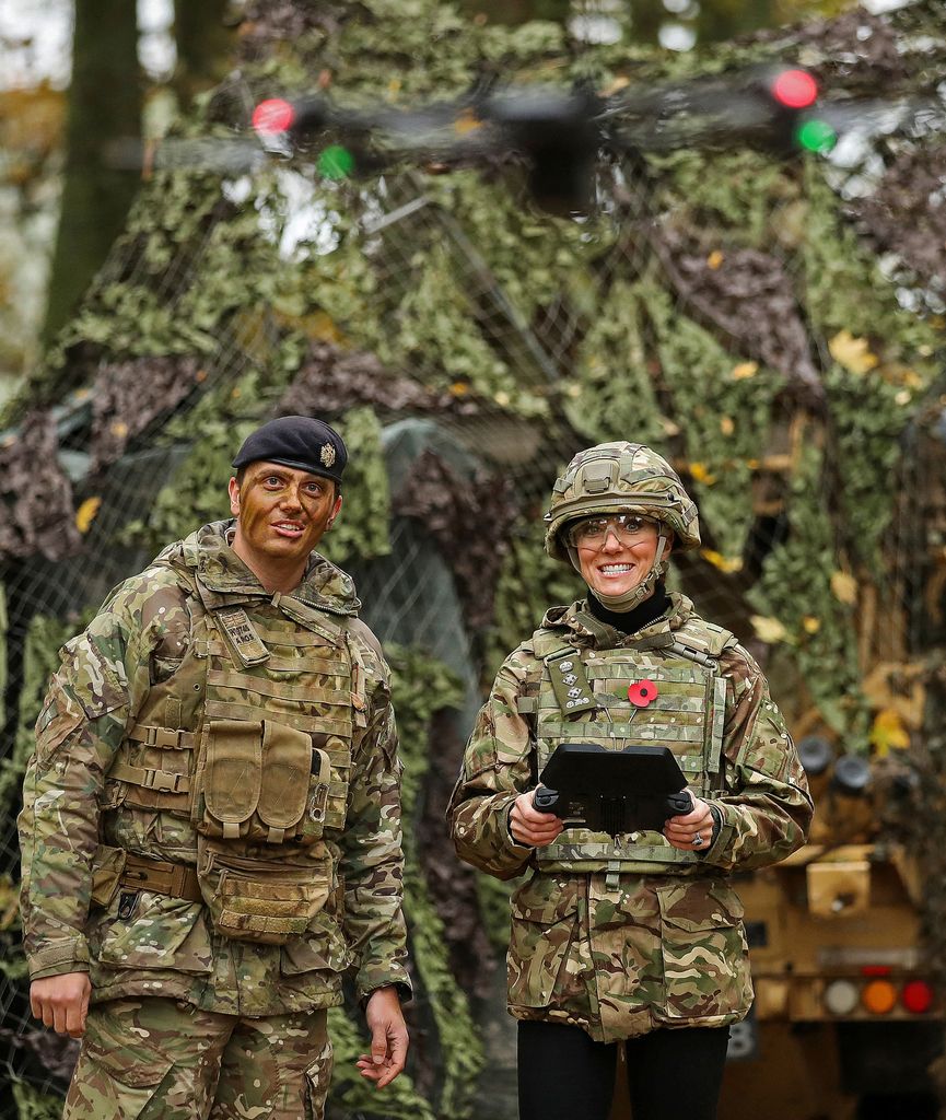 Kate Middleton flies a drone during a visit to the 1st The Queen's Dragoon Guards