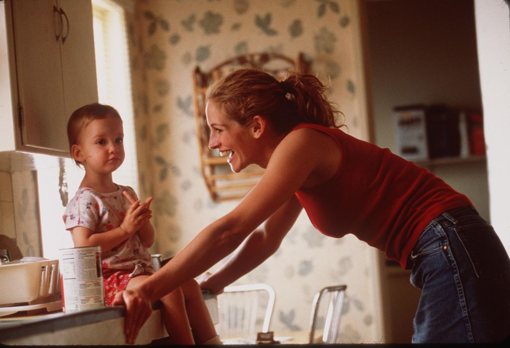 Julia roberts on set smiling at child