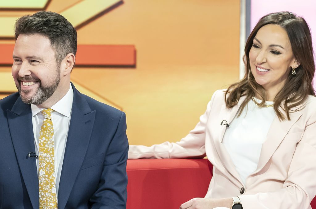 Presenters Jon Kay and Sally Nugent on the red sofa on BBC Breakfast