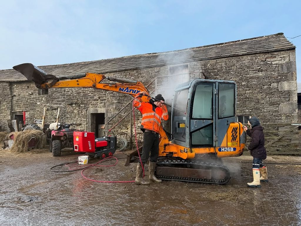Amanda Owen's kids fixing smoking farm machinery