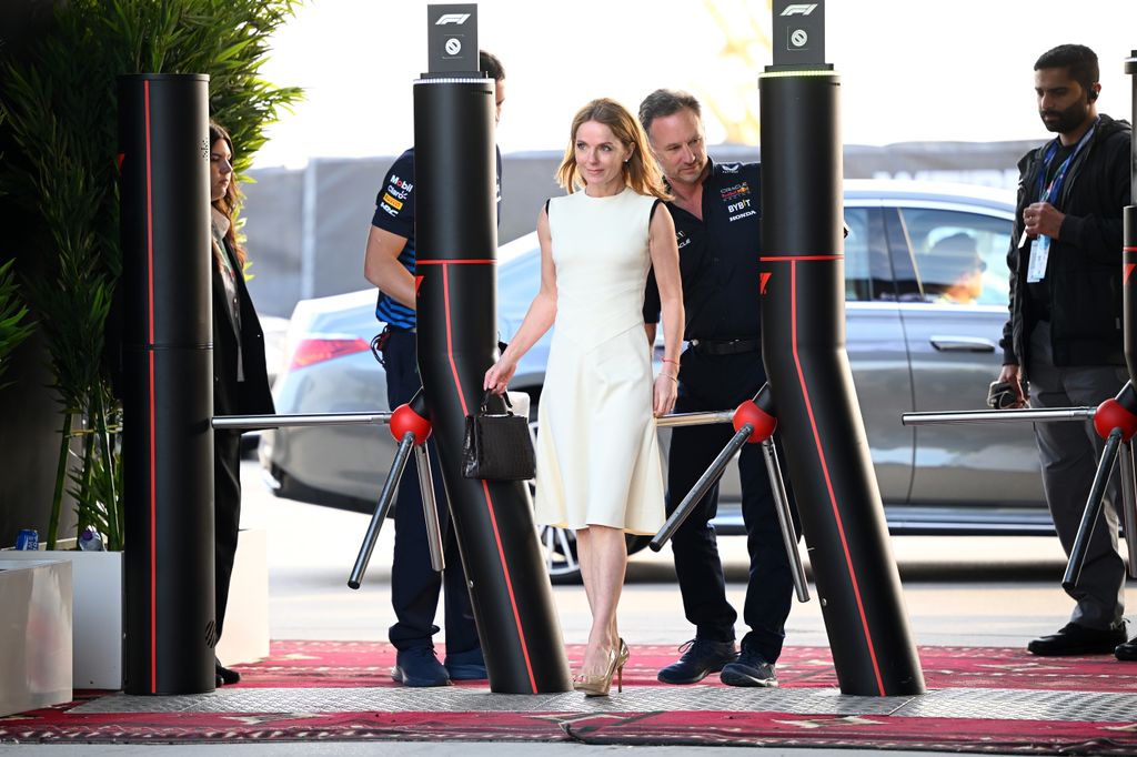 Geri Halliwell in a white dress and Christian Horner arriving at the Bahrain Grand Prix