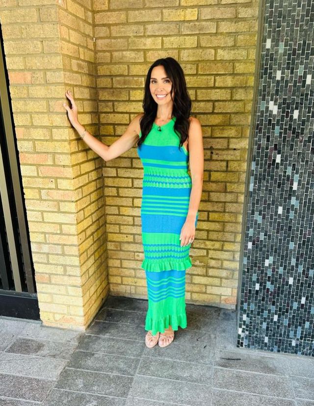 Christine Lampard in blue and green trumpet dress