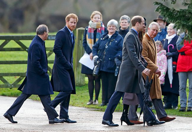 Prince Harry walking behind other members of royal family