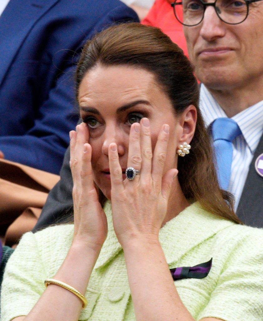 Kate Middleton wiping tears
