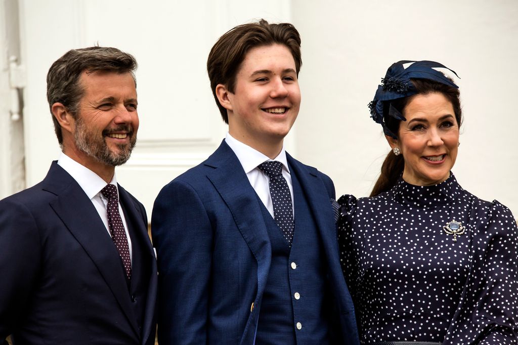 Frederik, Christian and Mary smiling at confirmation