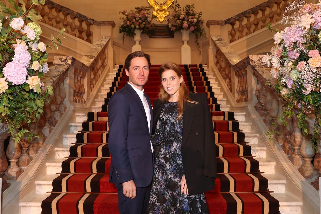 Edoardo Mapelli Mozzi and Princess Beatrice in front of staircase