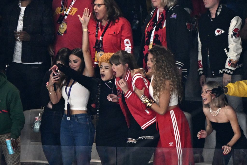 Taylor Swift and friends watching the Super Bowl