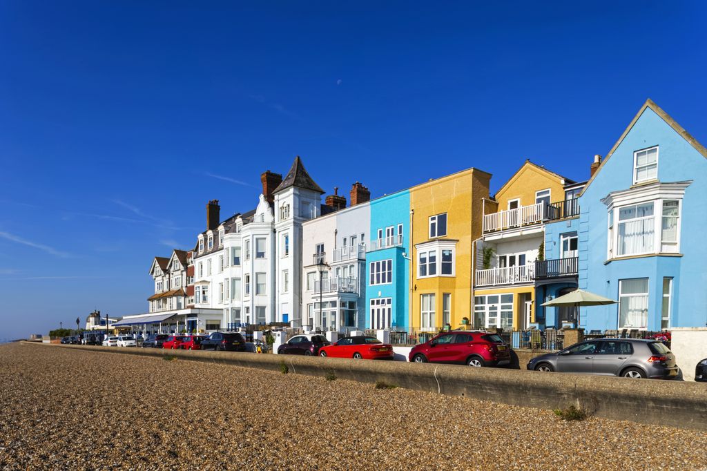 England, Suffolk, Aldeburgh, Aldeburgh Beach and Colourful Seafront Buildings. (Photo by: Dukas/Steve Vidler/Universal Images Group via Getty Images)