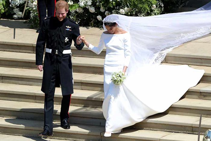 Meghan Markle reveals her wedding heels as she walks down stairs