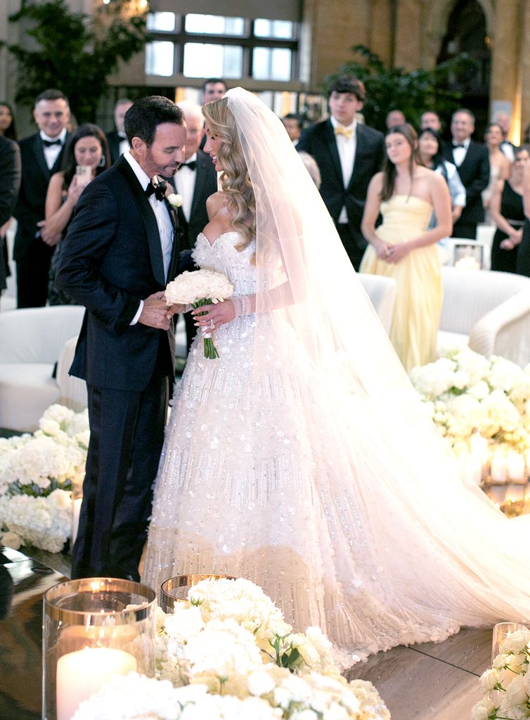 Richard Gonzalez and his bride Sarah Rollins at the alter