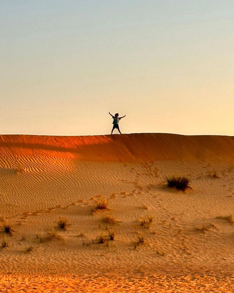 Peter Andre's son Theo posing in the desert