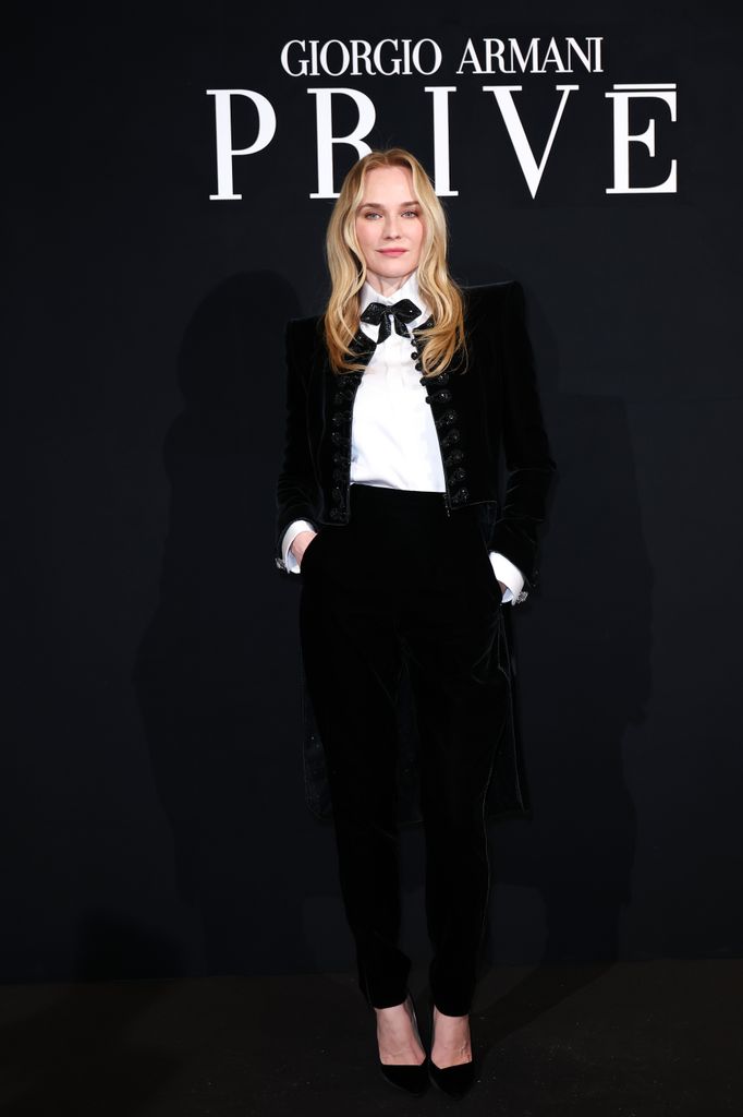Diane Kruger in black suit at the Giorgio Armani Privé Haute Couture Show