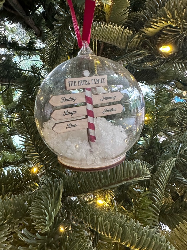 bauble with names in on christmas tree