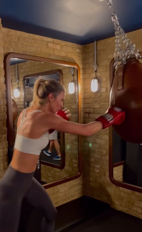 Frida Redknapp boxing a punching bag