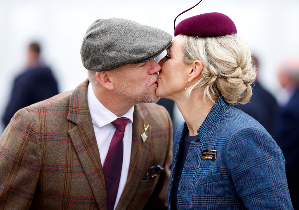 Mike and Zara Tindall kiss at Cheltenham races