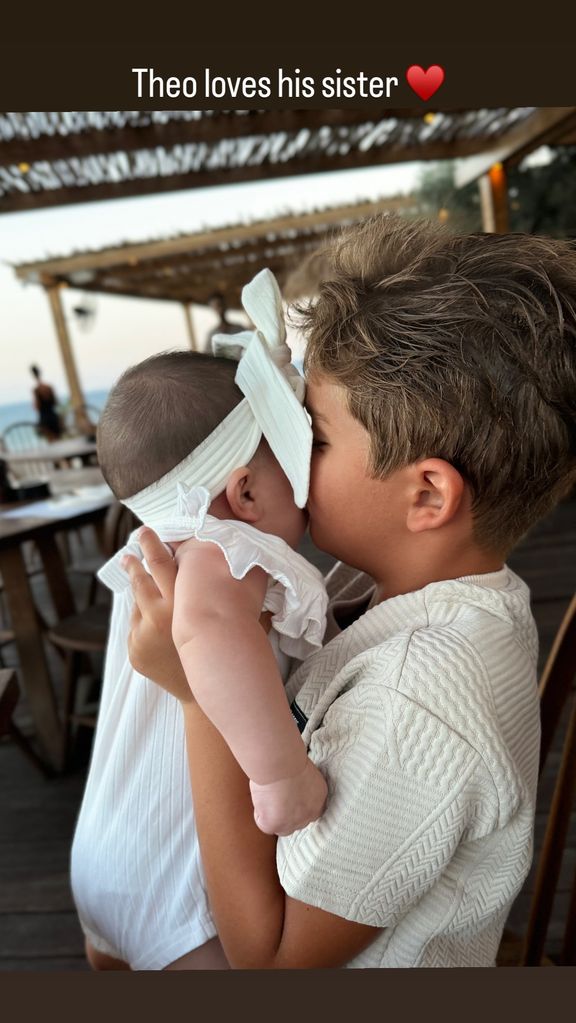 Theo appeared to be bonding with his baby sister