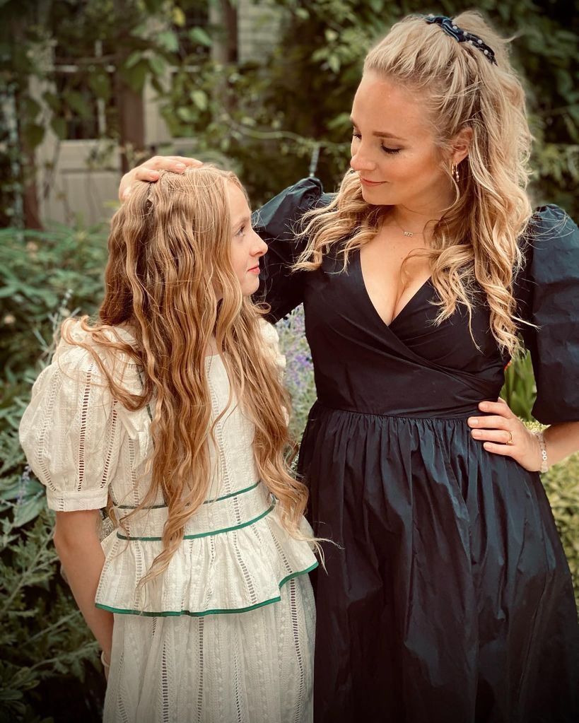 Georgia and her daughter posing with matching hair