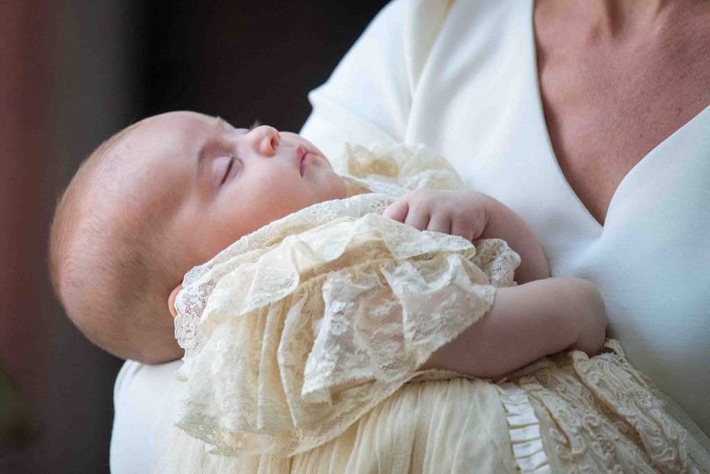 A baby Prince Louis in a christening gown