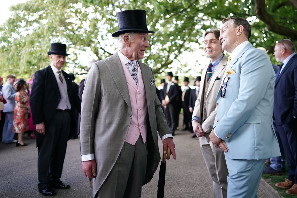 King Charles III meeting Barney Walsh and Bradley Walsh during the Sovereign's Creative Industries Garden Party 