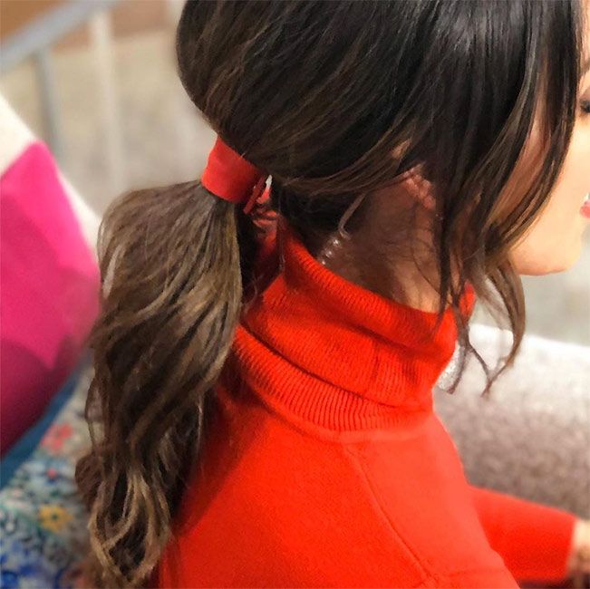 Christine Lampard ponytail with red ribbon