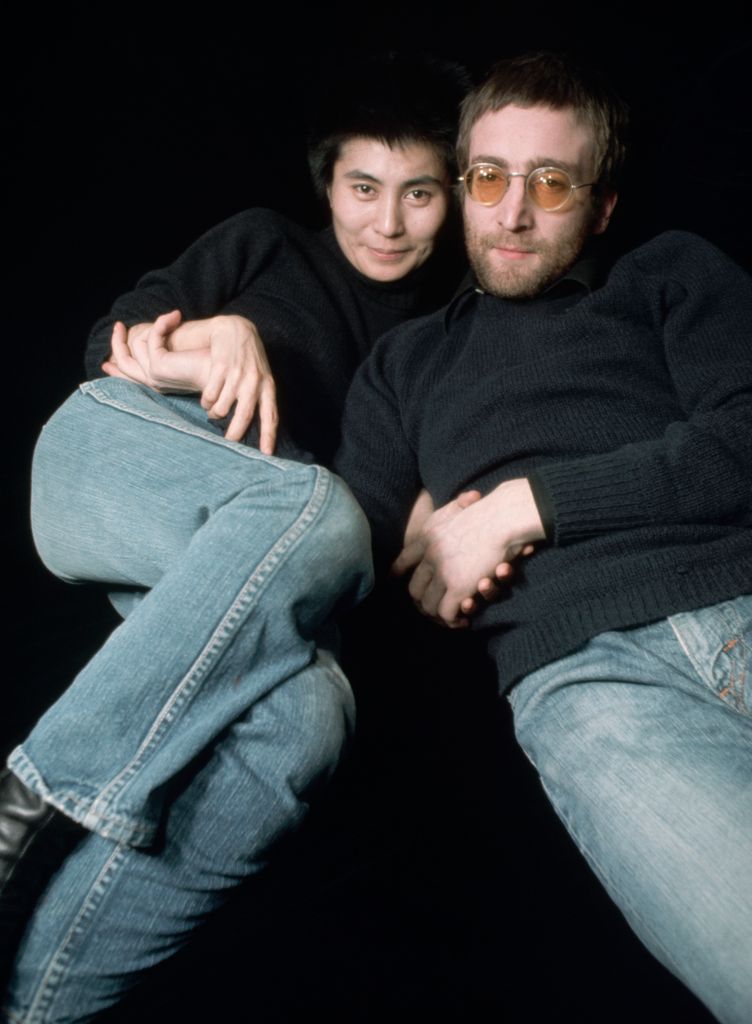 John Lennon and Yoko Ono with cropped hair and matching outfits, 1973. (Photo by Penny Tweedie/CORBIS/Corbis via Getty Images)