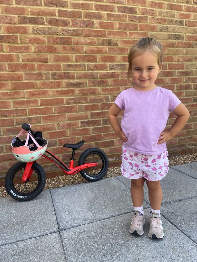 Ella with her balance bike 