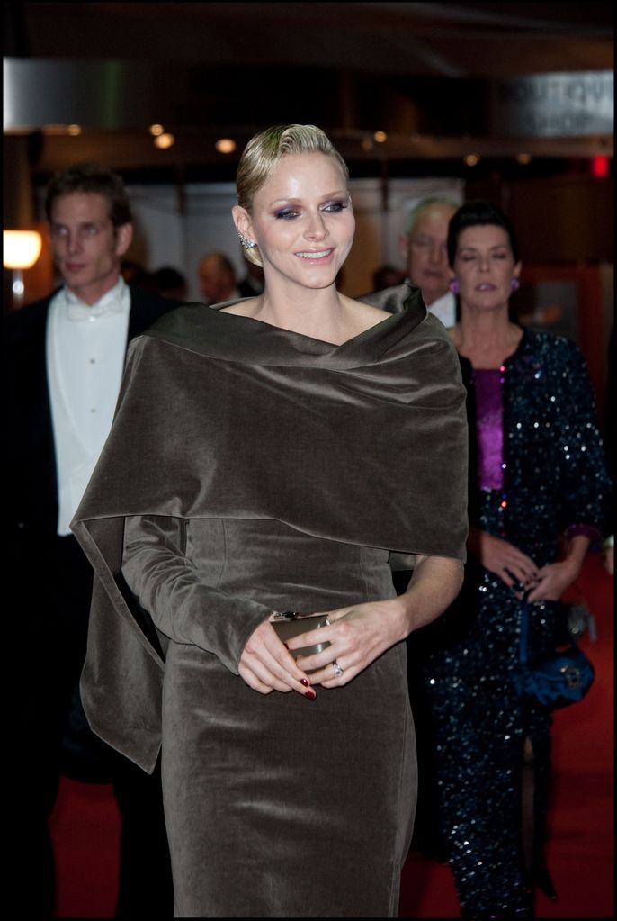 Princess Charlene arrives at gala in taupe dress