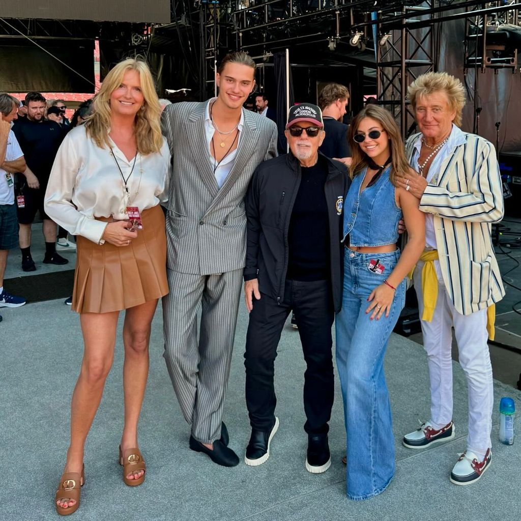 Penny posed with her son and Sir Rod andI  Billy Joel