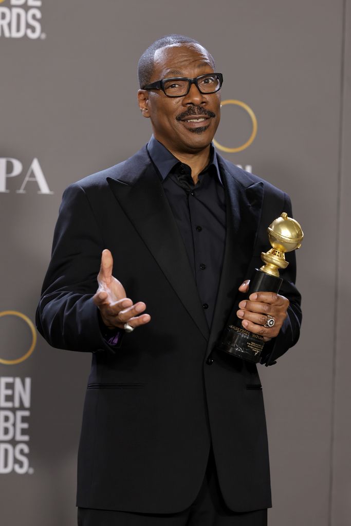  Eddie Murphy poses with the Cecil B. Demille Award in the press room during the 80th Annual Golden Globe Awards 