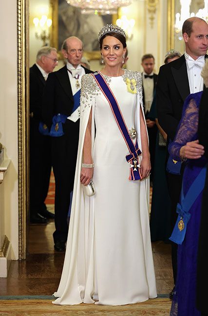 Princess of Wales in a Jenny Packham bridal gown and blue sash
