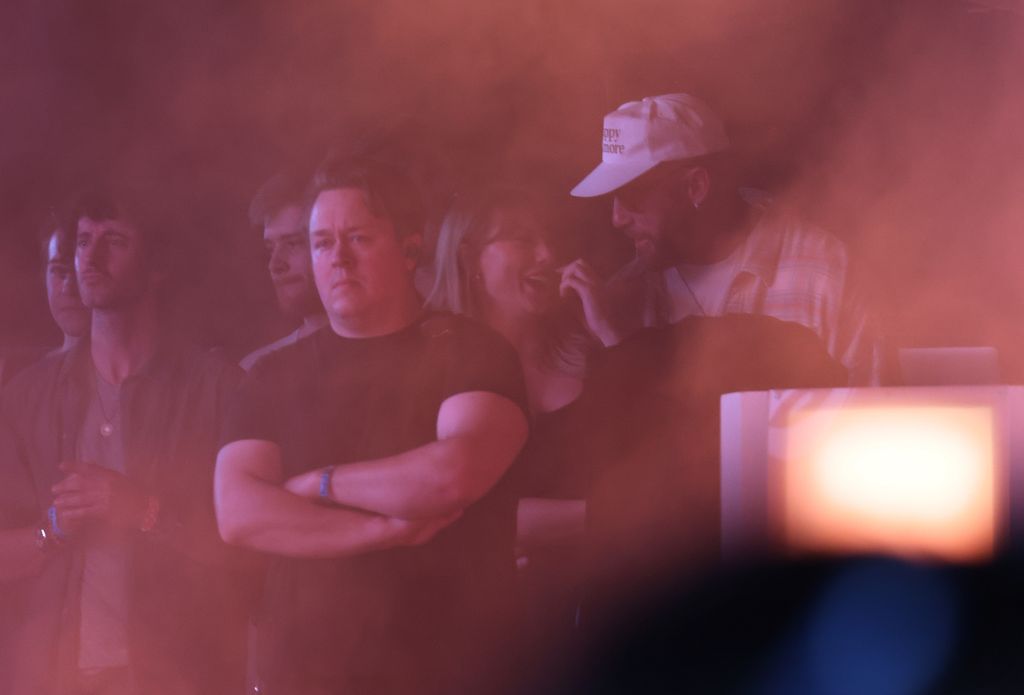 Taylor Swift and Travis Kelce watch Bleachers perform at Coachella on Saturday, April 13, 2024.