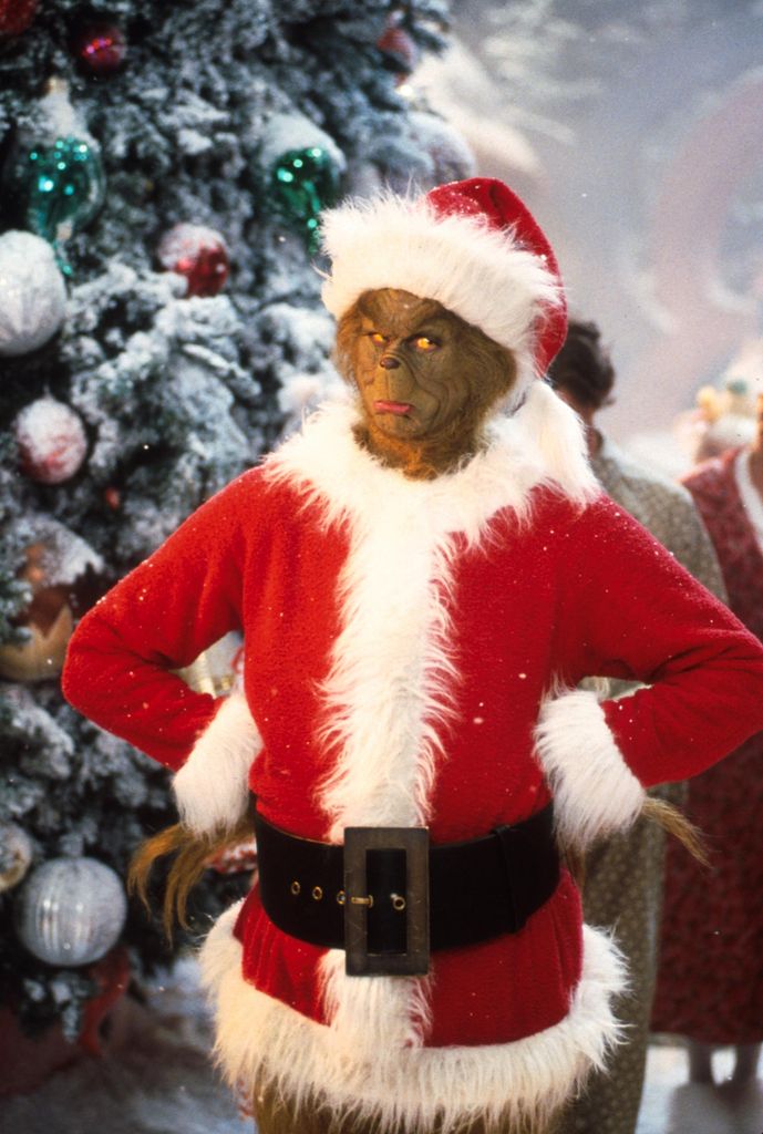 Jim Carrey Stars As The Grinch, The Green Monster Who Disguises Himself As Santa Claus And Burglarizes Every Single House In The Village Of Whoville On Christmas Eve In The Live-Action Adaptation Of The Famous Christmas Tale, "Dr. Seuss' How The Grinch Stole Christmas," Directed By Ron Howard.