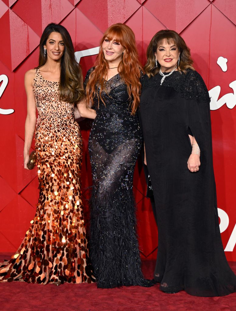 Amal was joined by makeup artist Charlotte Tilbury and her mother Baria Alumuddin 