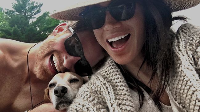 Prince Harry and Meghan Markle with their dog Guy