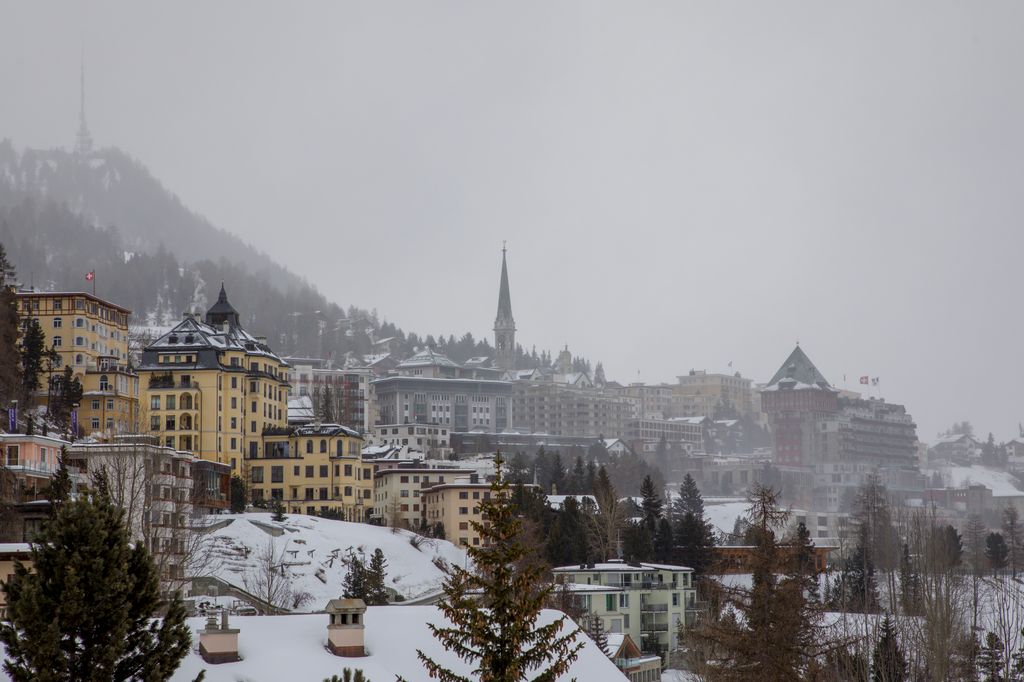 St Moritz Village and Lake covered by snow in Winter 