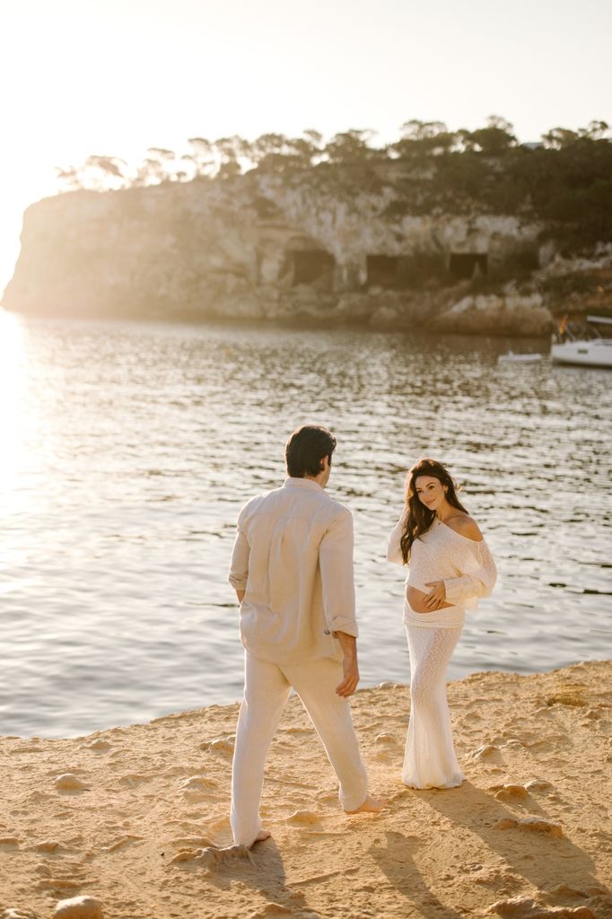 Mark Wright and Michelle Keegan on a beach during a pregnancy shoot in Majorca