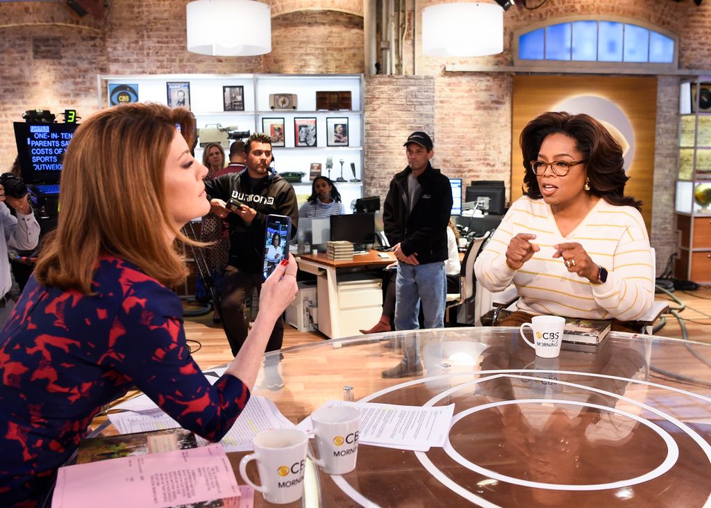 NEW YORK - APRIL 10: Oprah is interviewed LIVE on CBS This Morning discussing her new book "The Path Made Clear". Pictured L to R: Norah ODonnell and Oprah. (Photo by Michele Crowe/CBS via Getty Images) 