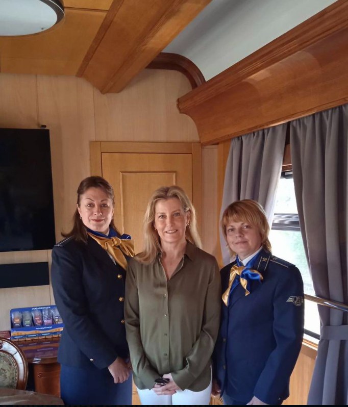 Sophie with two Ukrainian Railways staff