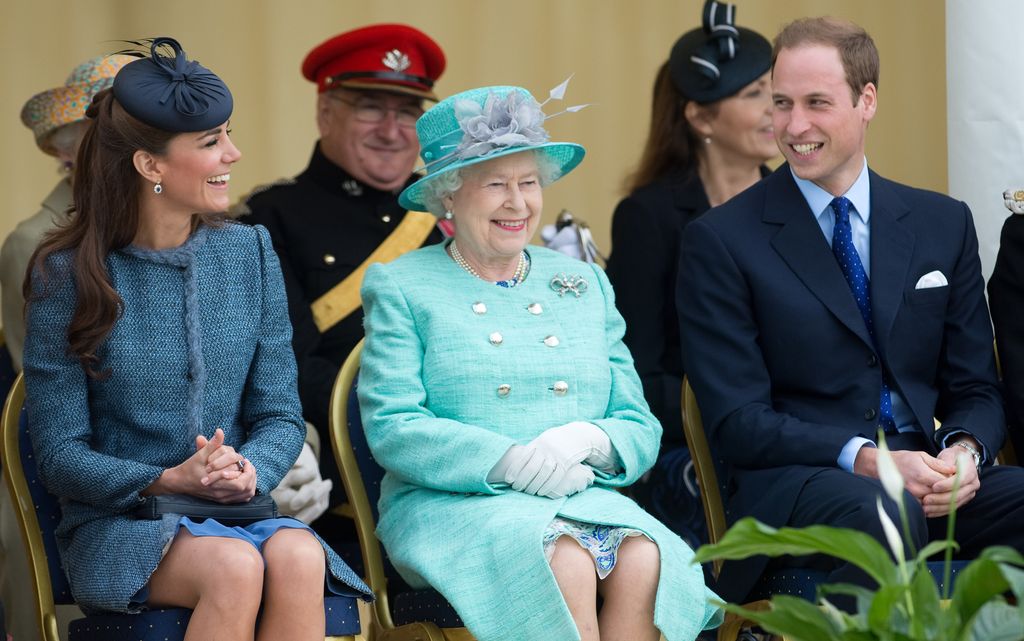 Prince William, the Queen and Princess Kate laughing 