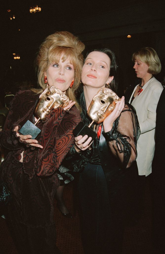 Joanna Lumley and Jennifer Saunders smiling at the BAFTAs 