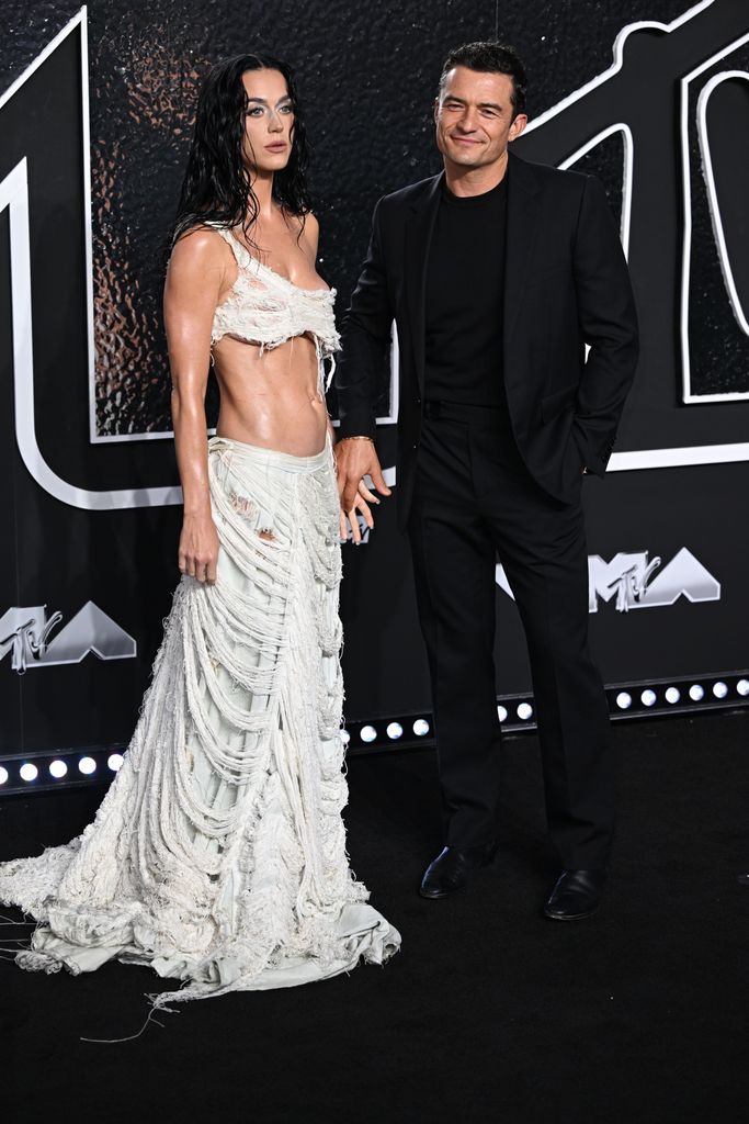 Katy Perry (left) and Orlando Bloom attending the MTV Video Music Awards 2024 held at the UBS Arena in New York